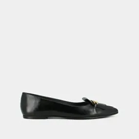 Ballet flats with gold bits in black leather